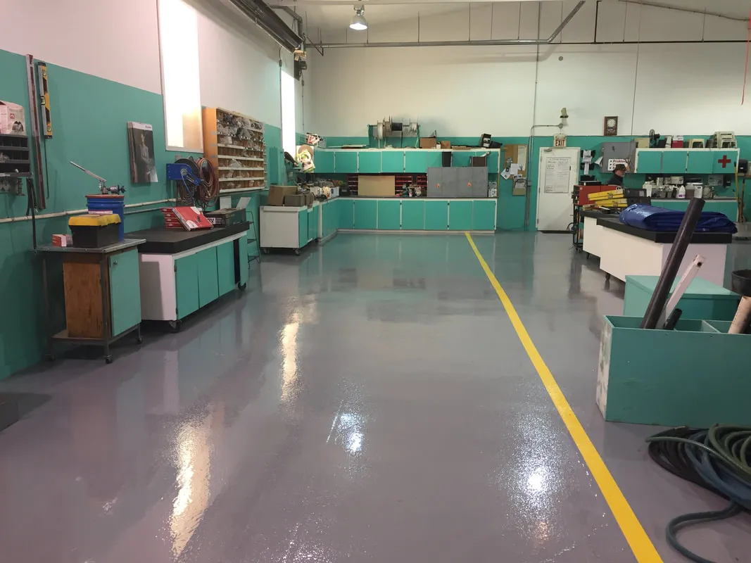 Solid Grey epoxy floor — RV garage — by LB Epoxy Flooring